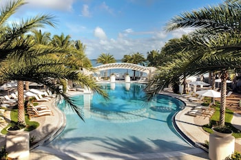 Outdoor pool, cabanas (surcharge), pool umbrellas at Playa Largo Resort & Spa, Autograph Collection