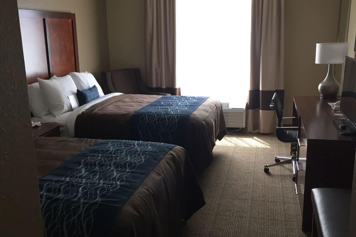 Premium bedding, down comforters, pillowtop beds, in-room safe