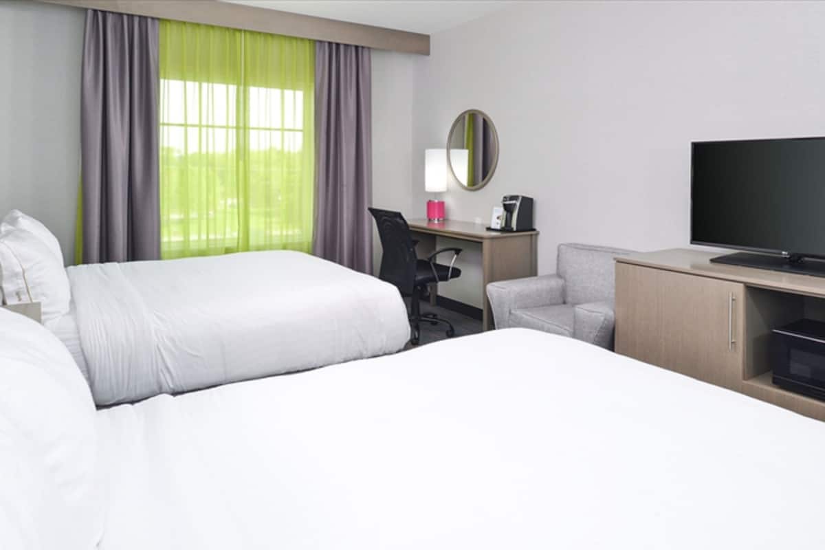 Desk, blackout curtains, iron/ironing board, rollaway beds