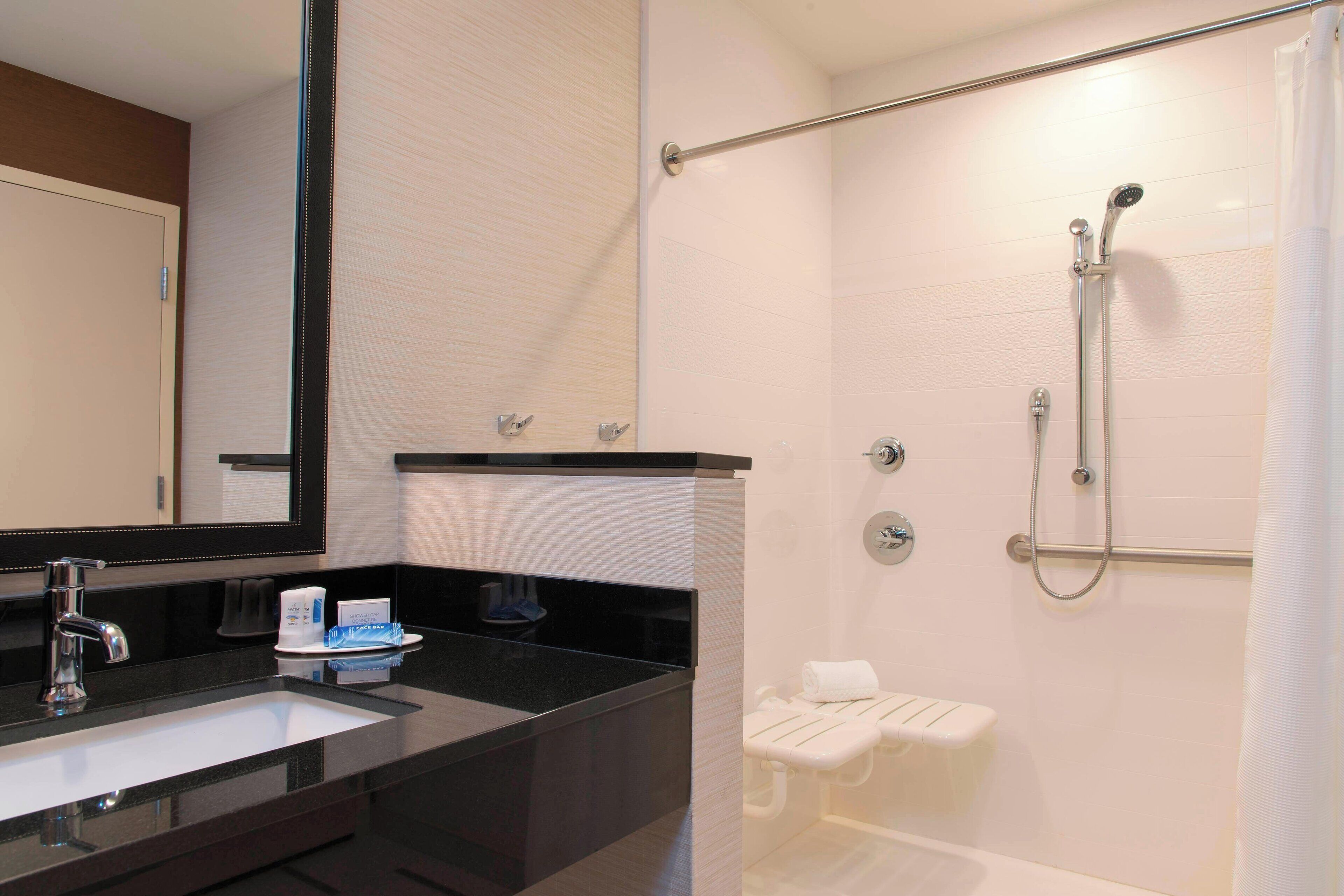 shower, free toiletries, hair dryer, towels