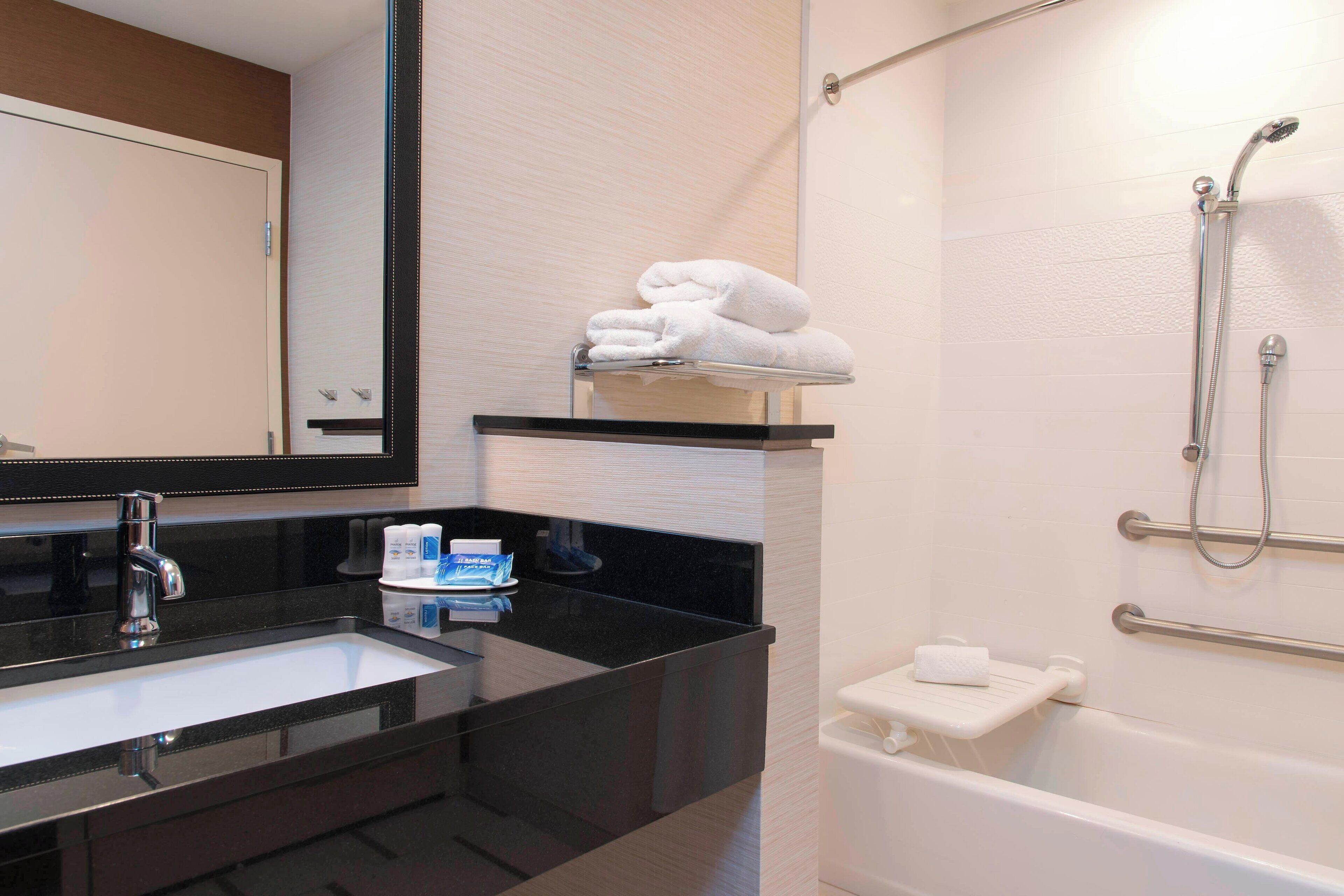 shower, free toiletries, hair dryer, towels