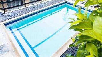 Outdoor pool, pool umbrellas, pool loungers