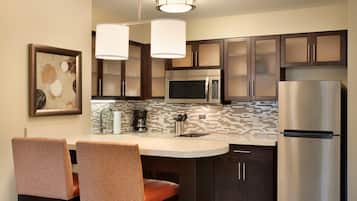 Full-sized fridge, microwave, stovetop, dishwasher