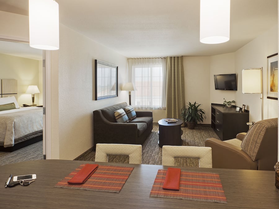 Down comforters, desk, laptop workspace, iron/ironing board