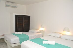 Chambre Standard, 2 lits doubles | Fer et planche à repasser, literie fournie