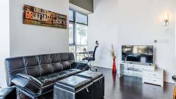 Panoramic Apartment, 1 King Bed with Sofa bed, City View (Sunset and Vine) | Living area | 40-inch LCD TV with digital channels, TV, Netflix