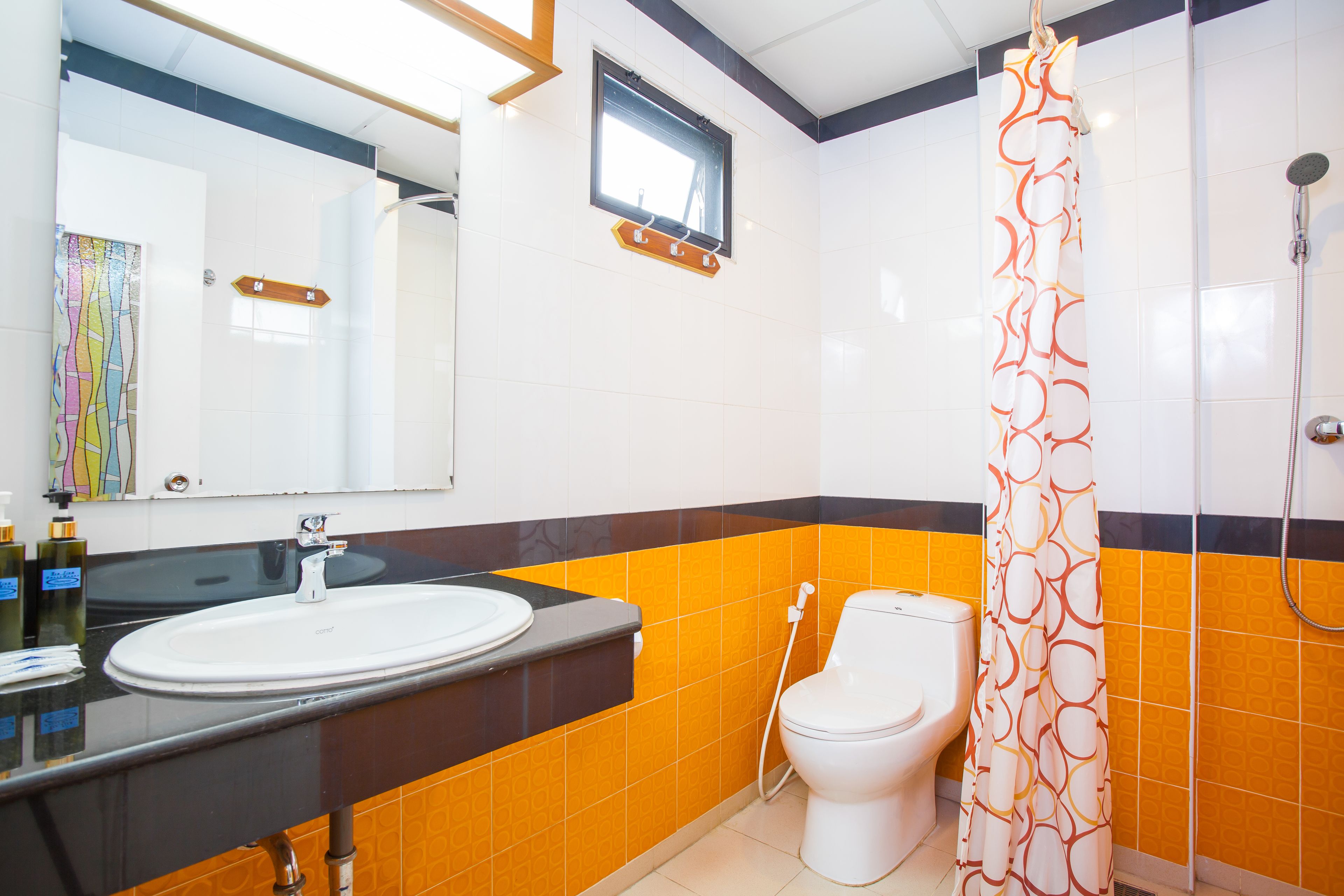 deluxe triple room | bathroom | shower, free toiletries, hair dryer, slippers