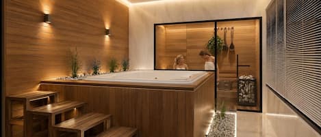 A modern spa area with a wooden hot tub, wooden benches, and a stone pathway.