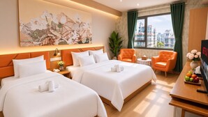 A hotel room with two beds, a desk, a chair, a TV, and a large window with curtains. - Two Elephants Hotel (Ho Chi Minh City)