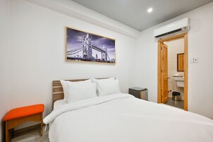 Ropa de cama de alta calidad y minibar 