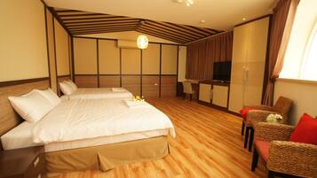 Family Suite, 1 Bedroom | Desk, soundproofing, WiFi (free), bed sheets