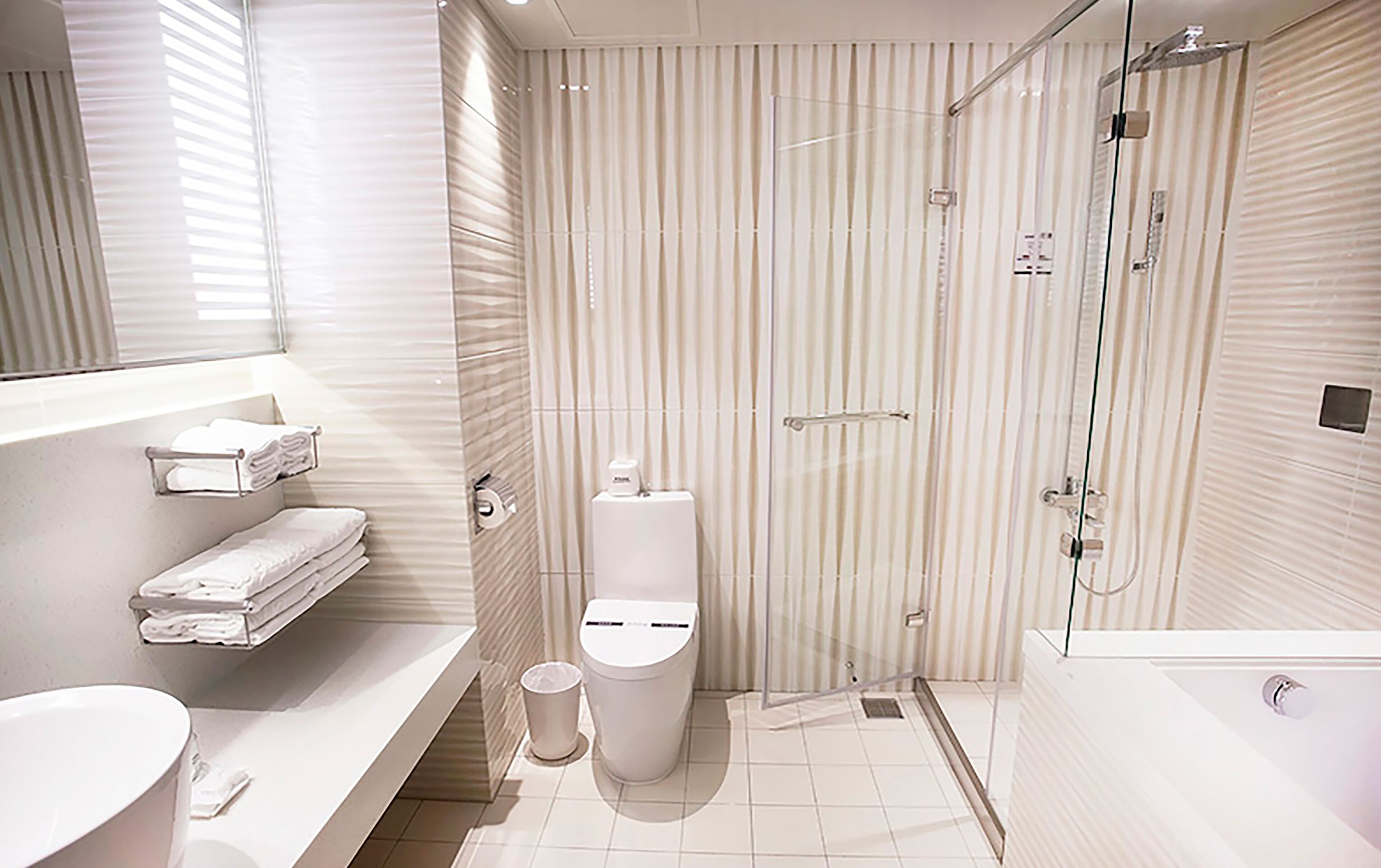 superior quadruple room | bathroom | separate bathtub and shower, free toiletries, hair dryer, slippers