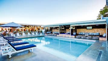 Outdoor pool, free pool cabanas, pool umbrellas