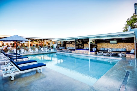 Outdoor pool, free cabanas, pool umbrellas