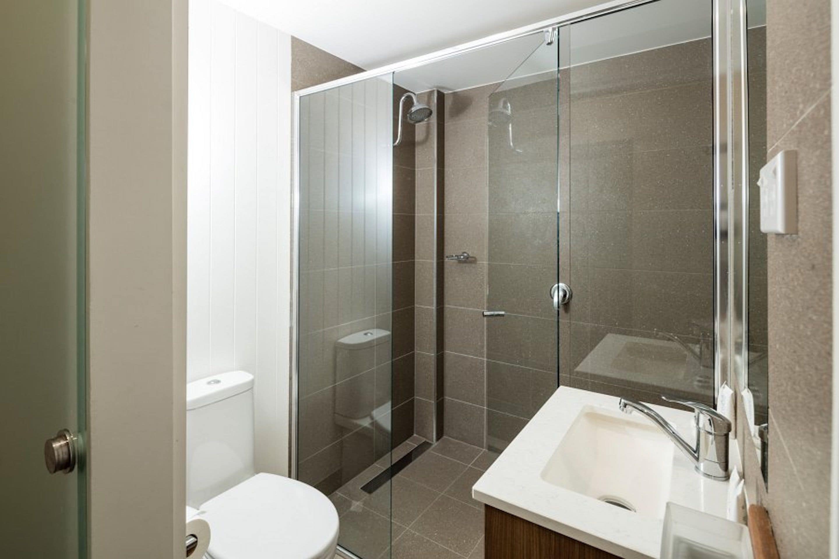 family room | bathroom | shower, free toiletries, hair dryer, towels