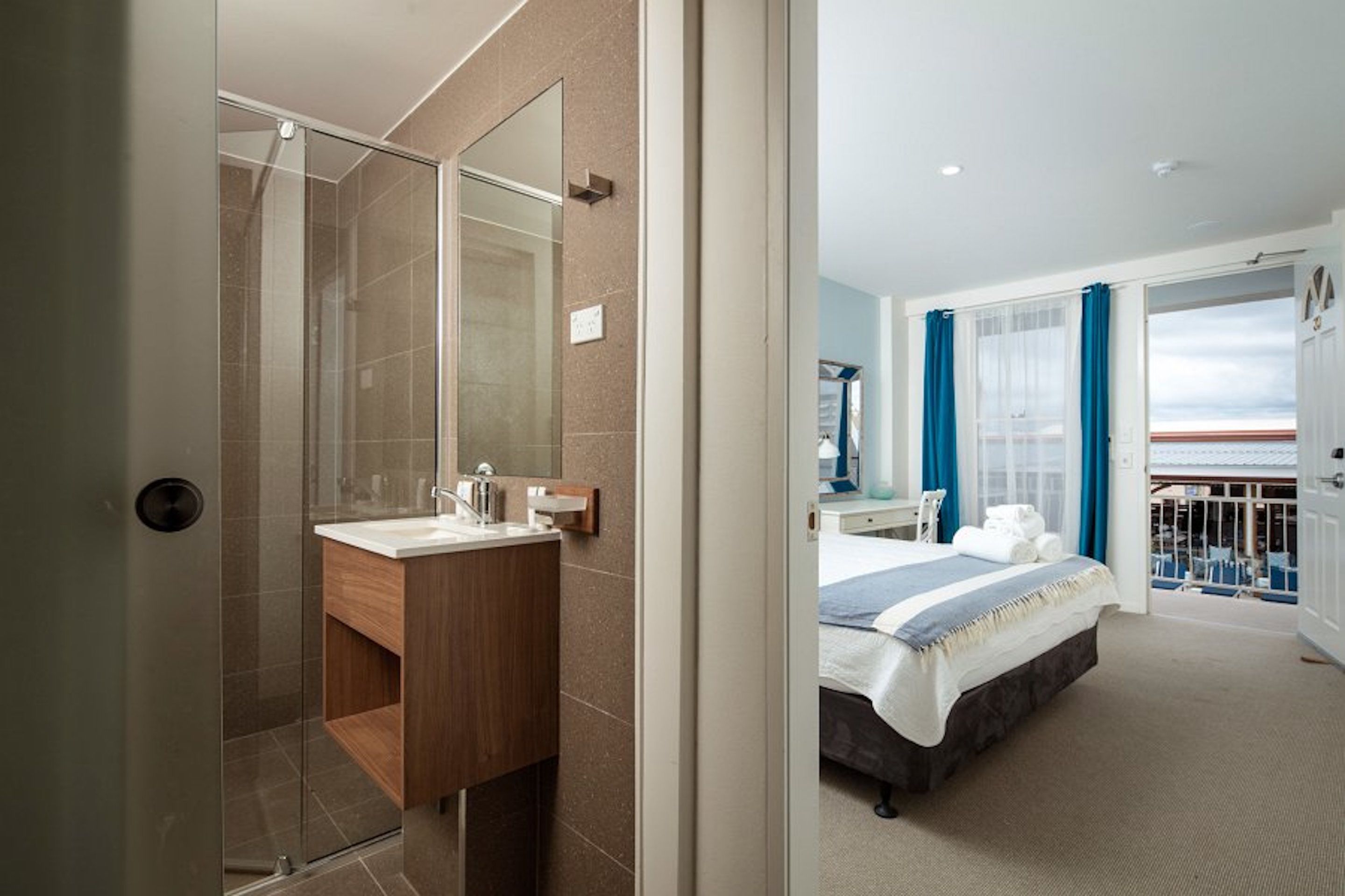 family room | bathroom | shower, free toiletries, hair dryer, towels