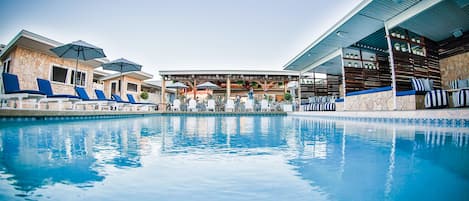 Outdoor pool, free cabanas, pool umbrellas