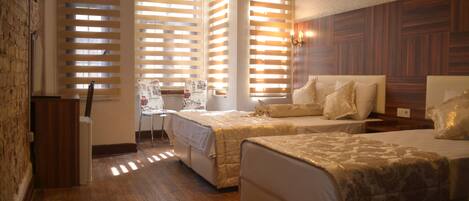 Deluxe Triple Room | Free cribs/infant beds, rollaway beds, free WiFi