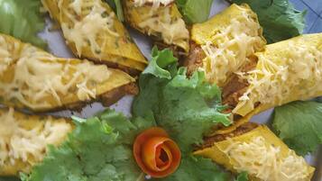 A plate of food with tortillas, cheese, and lettuce.