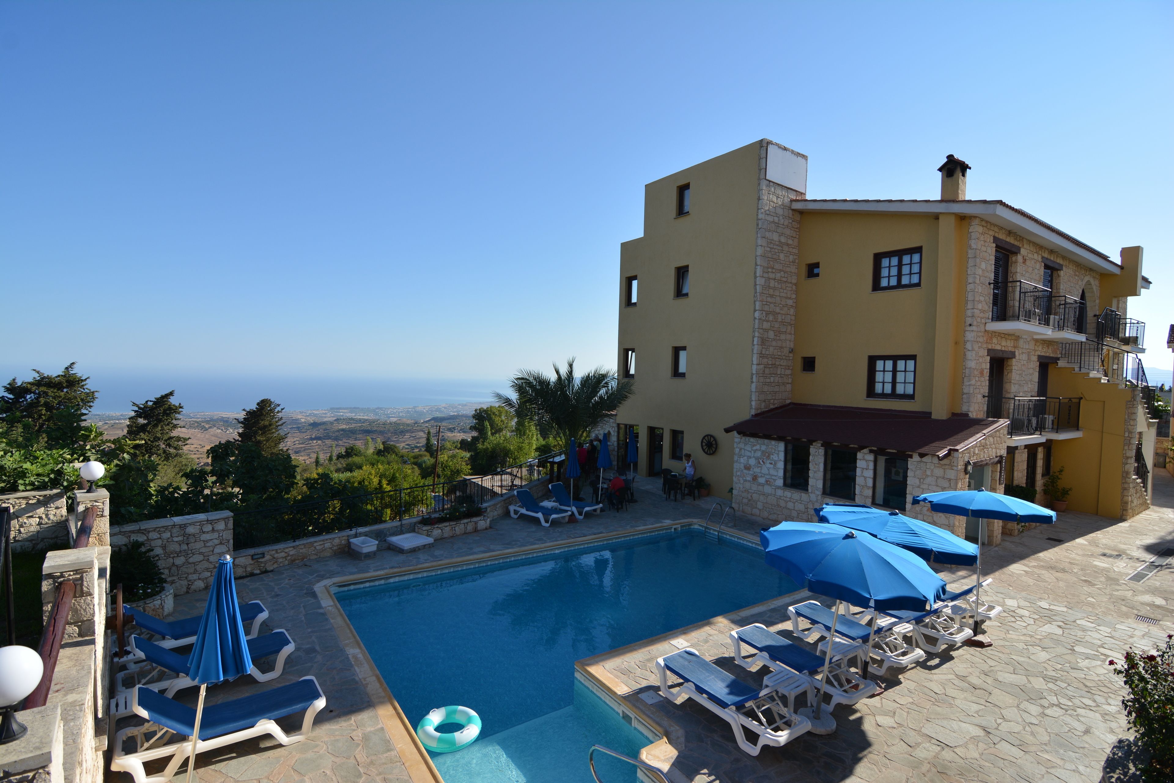 outdoor pool, pool umbrellas, pool loungers