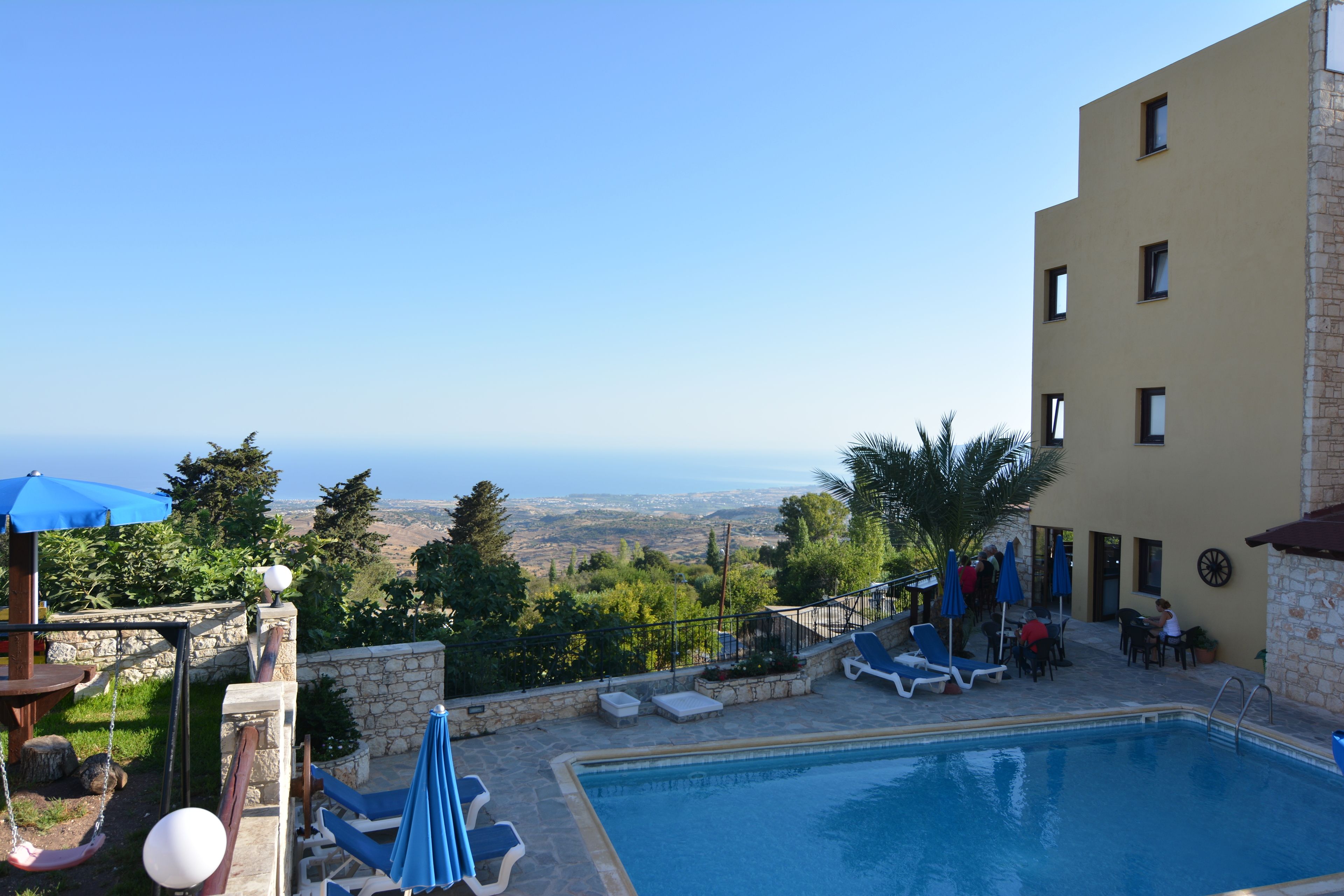 outdoor pool, pool umbrellas, pool loungers