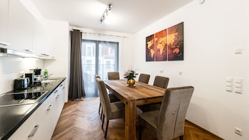 Standard Apartment, 2 Bedrooms, Balcony | Private kitchenette | Coffee/tea maker, full-sized fridge, microwave, oven