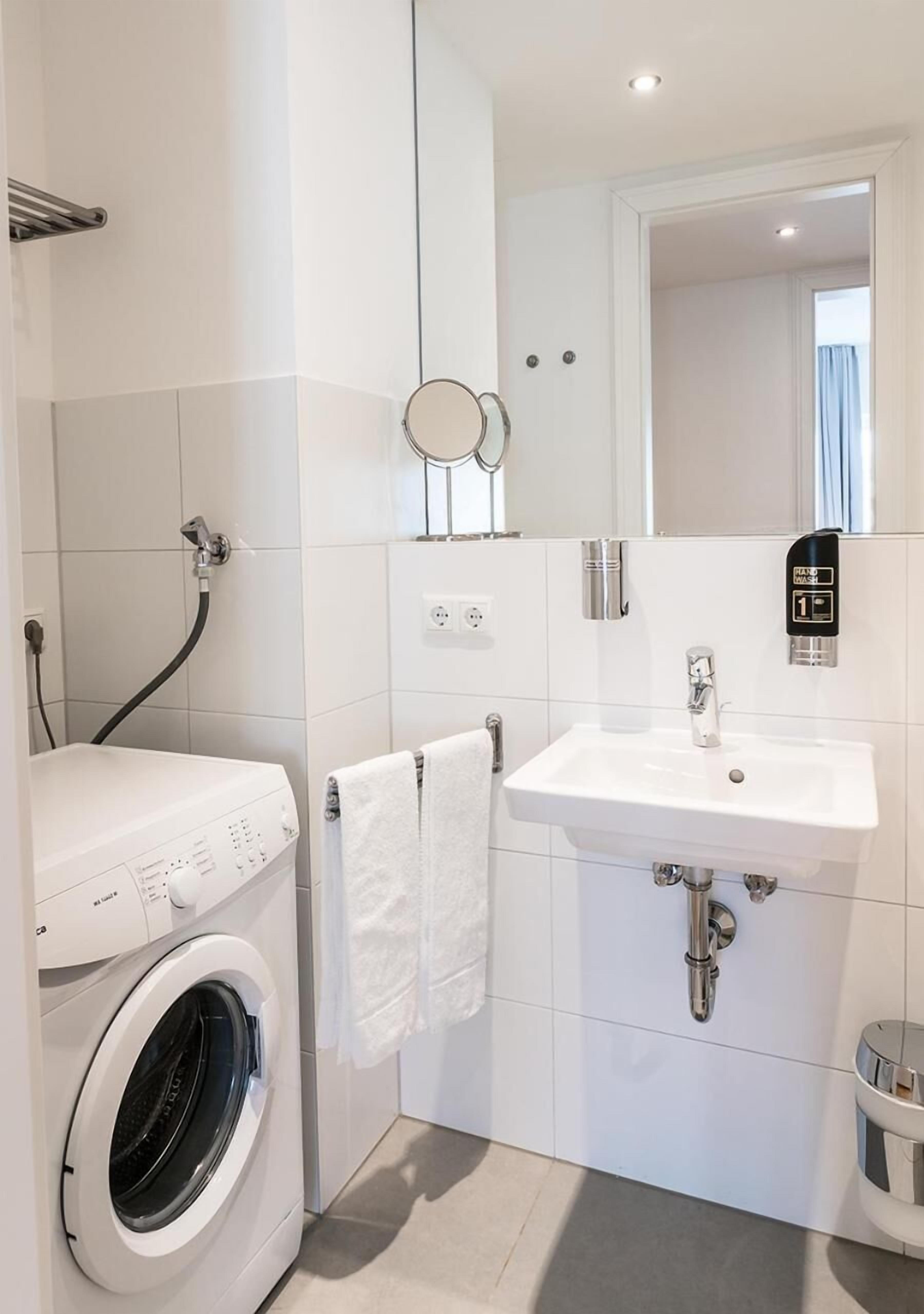 Standard Apartment, 2 Bedrooms, Balcony | Bathroom | Hair dryer, towels, soap, shampoo