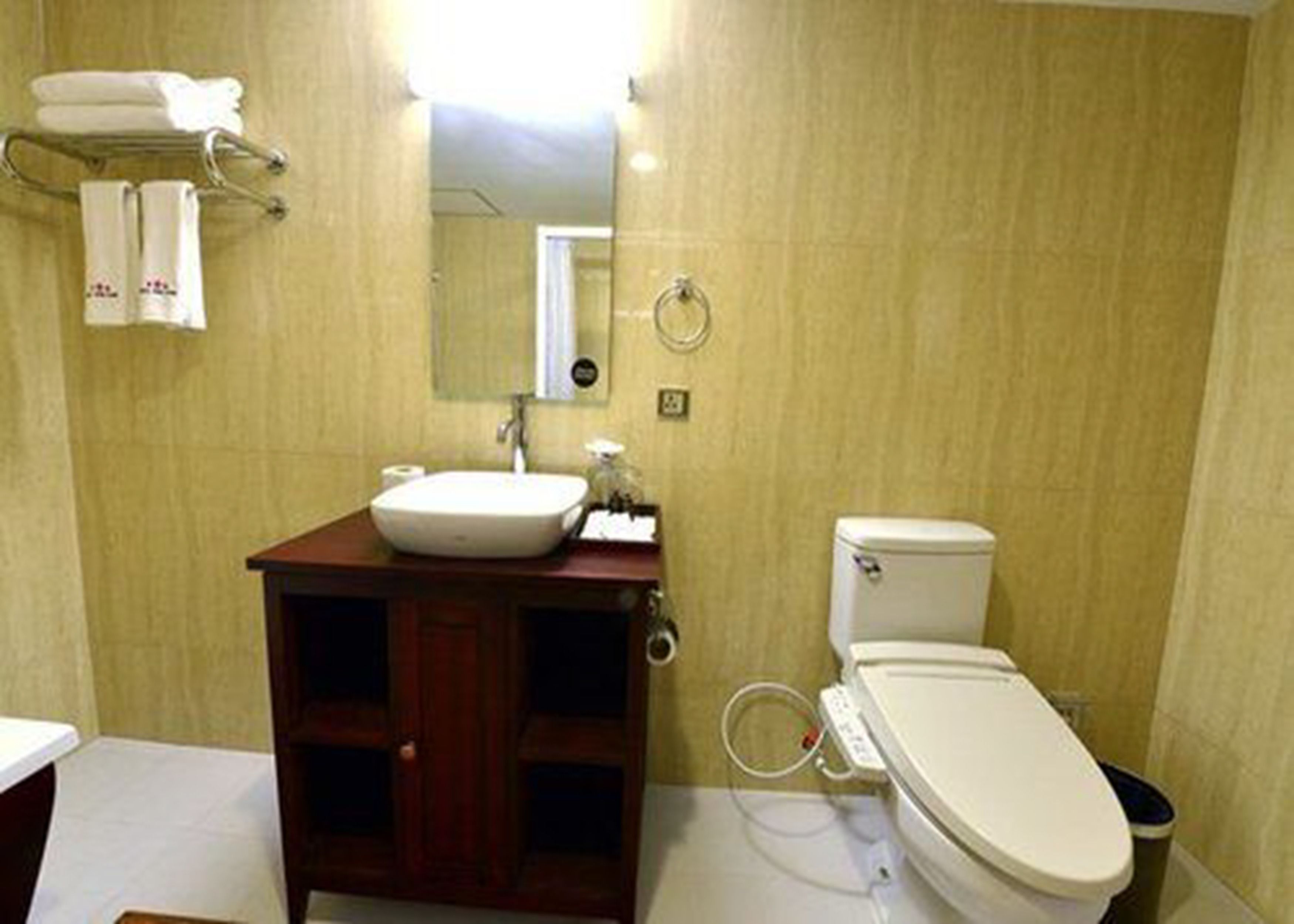 cherry deluxe room | bathroom | separate bathtub and shower, deep-soaking bathtub, rainfall showerhead