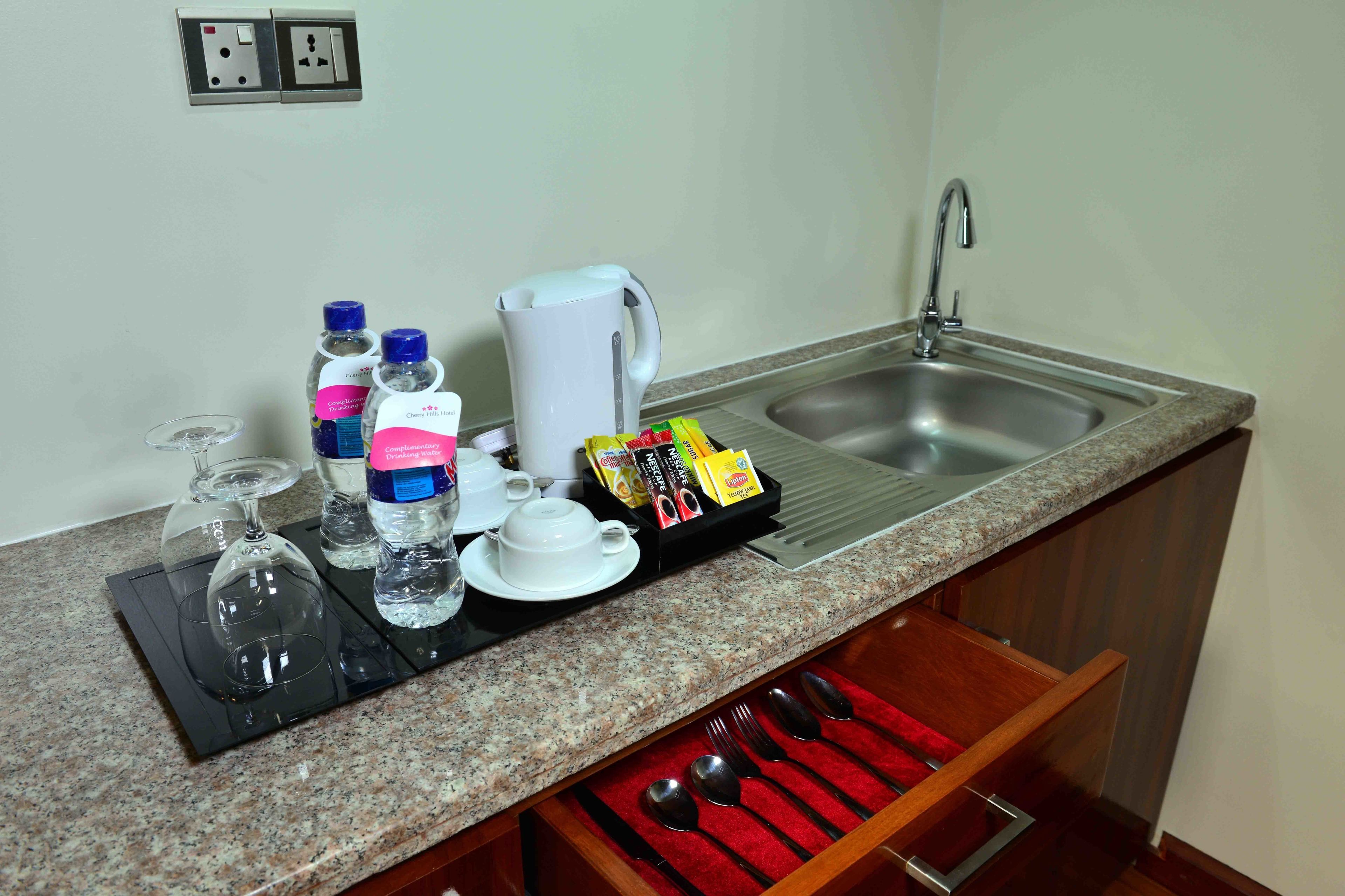 cherry deluxe plus room | private kitchenette | fridge, coffee/tea maker