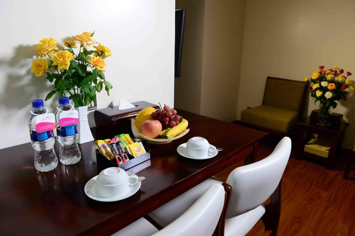 Cherry Deluxe Plus Room | Minibar, in-room safe, desk, blackout drapes