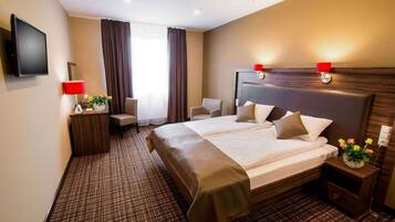 Premium bedding, minibar, desk, laptop workspace