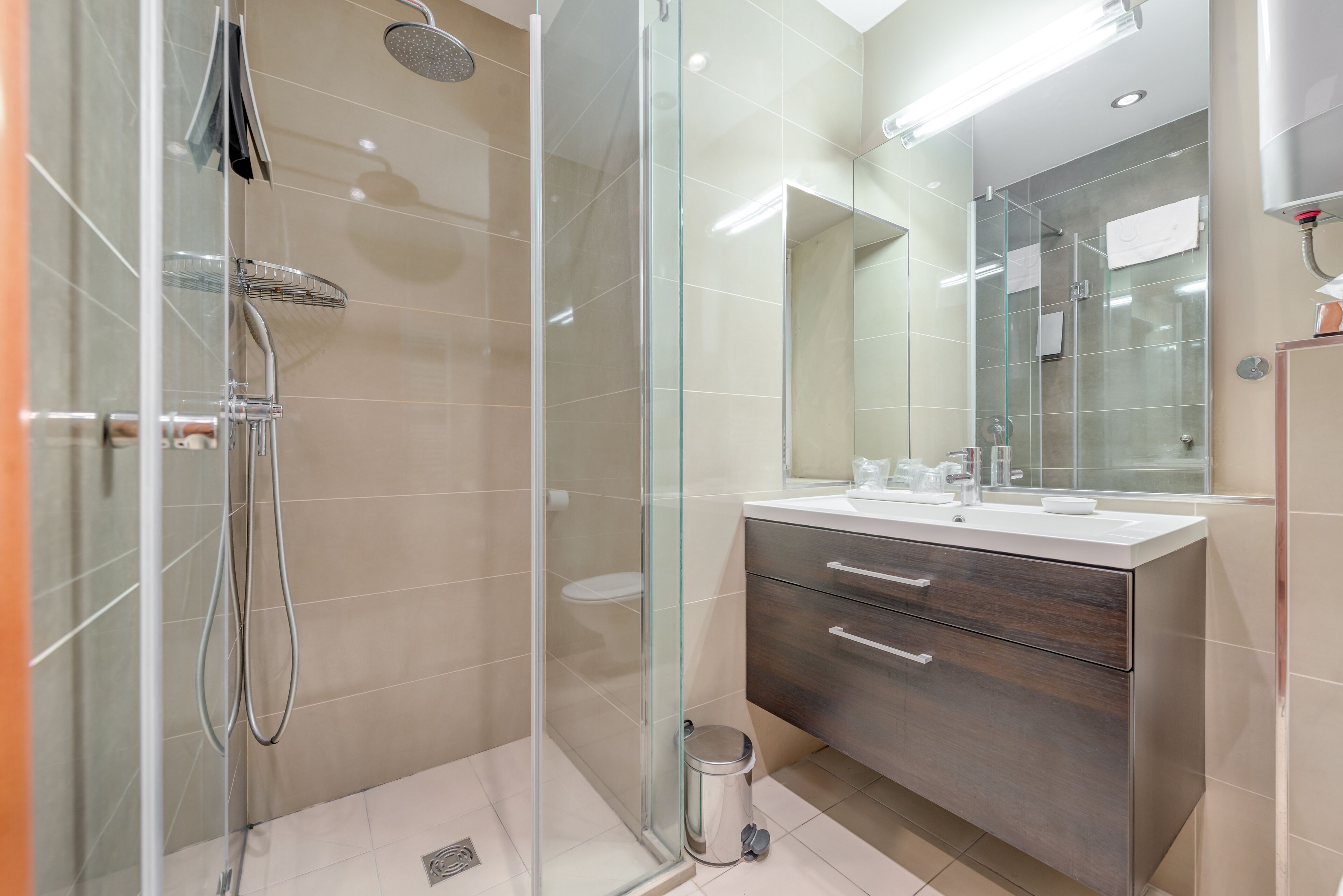 deluxe double room | bathroom | eco-friendly toiletries, hair dryer, slippers, towels