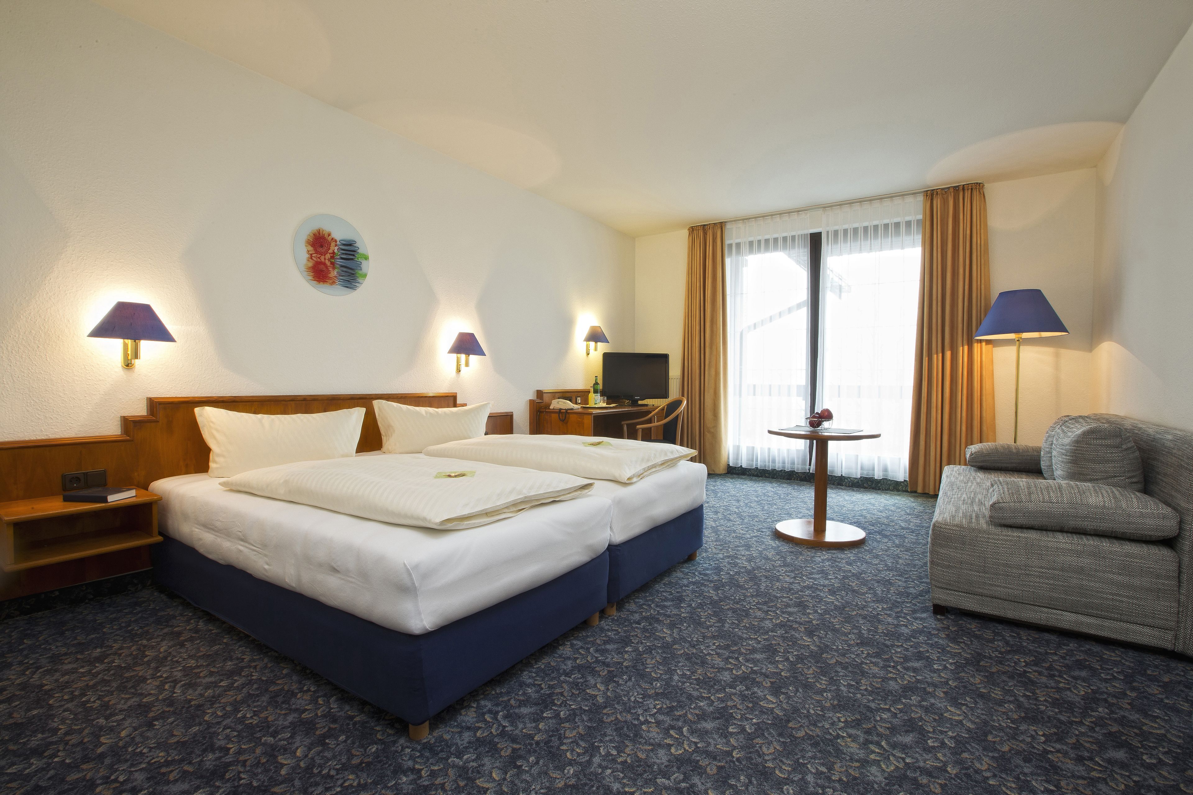 Comfort Double Room | Living area | Flat-screen TV