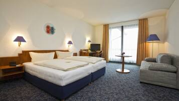 Comfort-Doppelzimmer | Wohnbereich | Flachbildfernseher