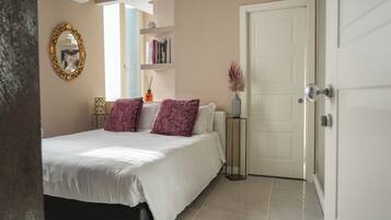Egyptian cotton sheets, premium bedding, memory-foam beds, minibar