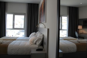 Habitación superior con 2 camas individuales | 1 dormitorio, ropa de cama de alta calidad, edredones de plumas