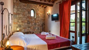 Suite estudio junior, 1 cama doble, terraza, vistas a la piscina | Minibar, caja fuerte, wifi gratis