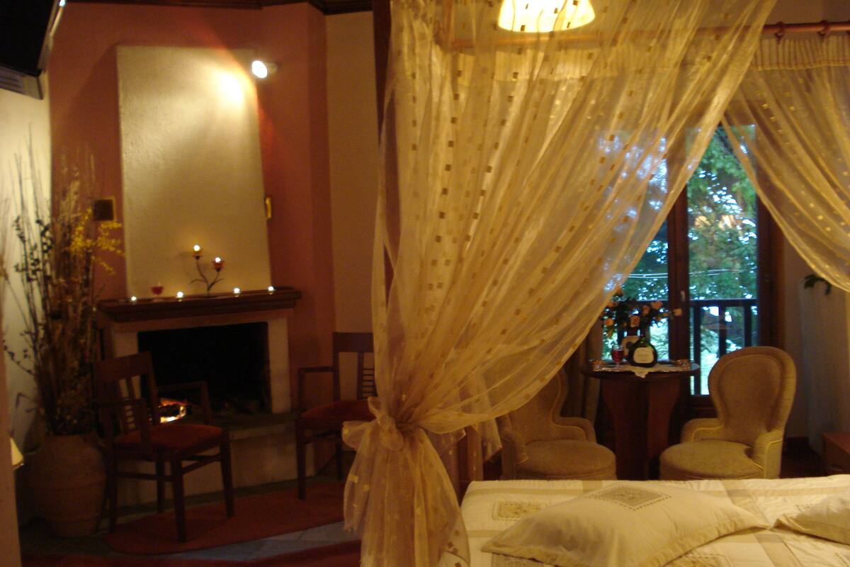 junior suite, fireplace, sea view | desk, bed sheets