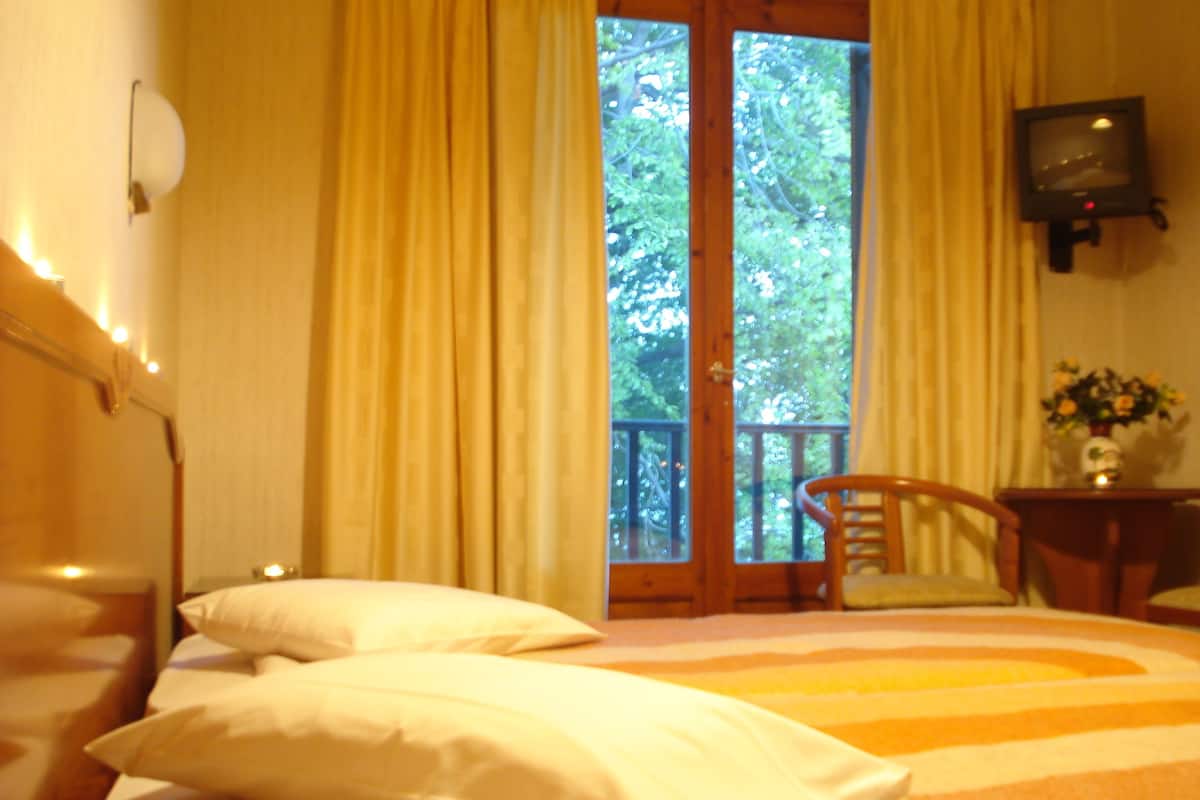 double or twin room, mountain view | desk, bed sheets