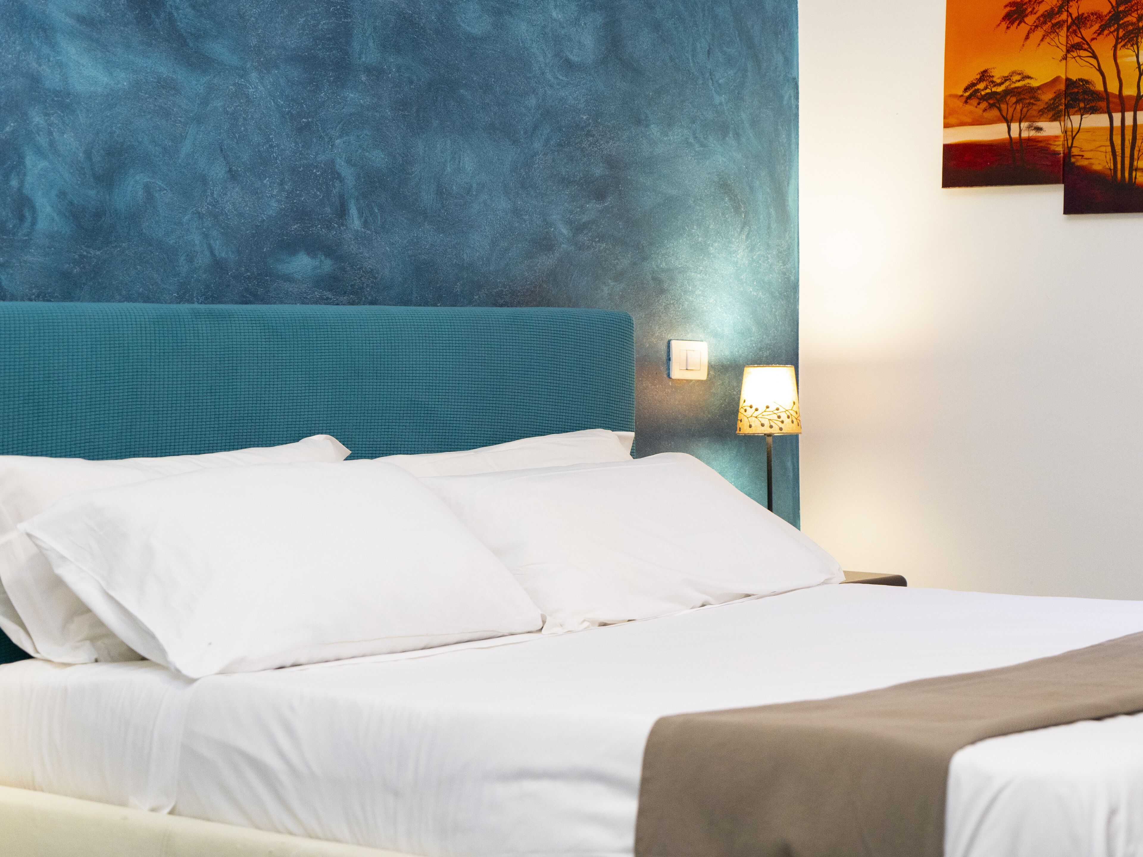 Qadruple room with en-suite bathroom | Premium bedding, down duvets, individually decorated