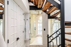 Atlas Suite | Bathroom | Separate tub and shower, rainfall showerhead, designer toiletries