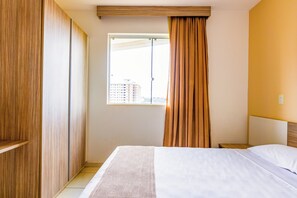 Family Room | Desk, laptop workspace, blackout drapes, free WiFi - Riviera Park Hotel by WAM Experience  (Caldas Novas)