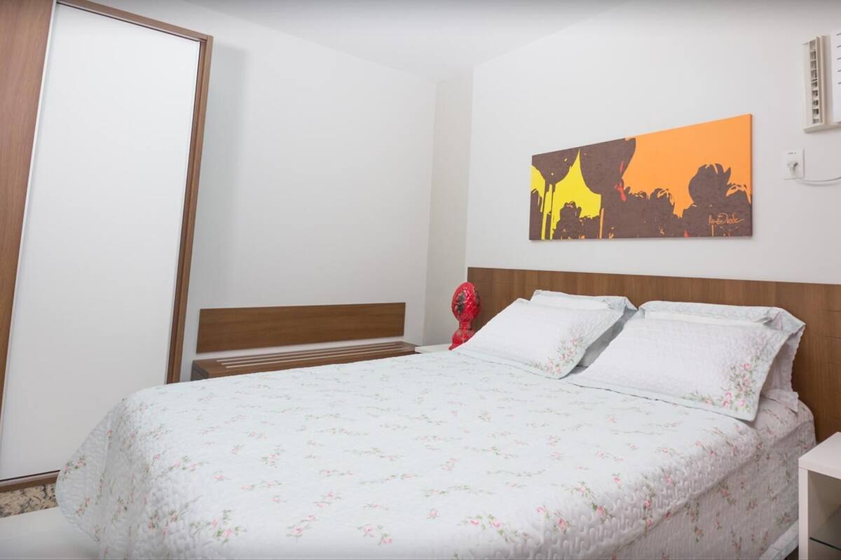 Minibar, desk, bed sheets
