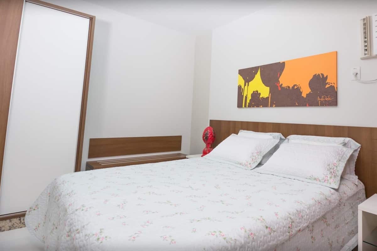 Minibar, desk, bed sheets