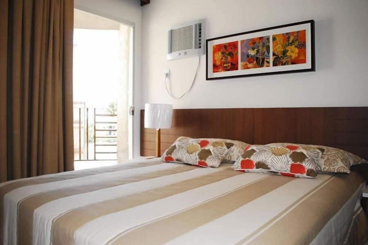 Minibar, desk, bed sheets