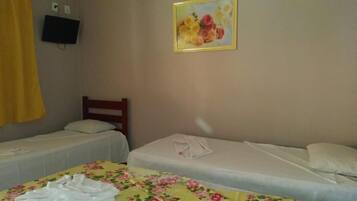 Frigobar, cortinas blackout, Wi-Fi de cortesia, roupa de cama