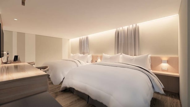 Standard Quadruple Room | Blackout drapes, WiFi (free), individually decorated, bed sheets - Ta Lee Hotel (Tainan)