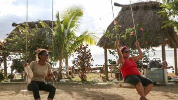 Private beach, free beach cabanas, beach yoga, beach volleyball