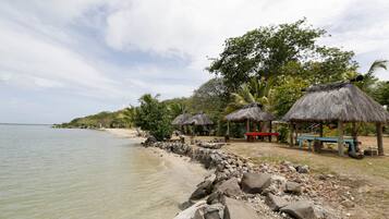 Private beach, free beach cabanas, beach yoga, beach volleyball