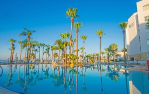 Outdoor pool, pool umbrellas, pool loungers